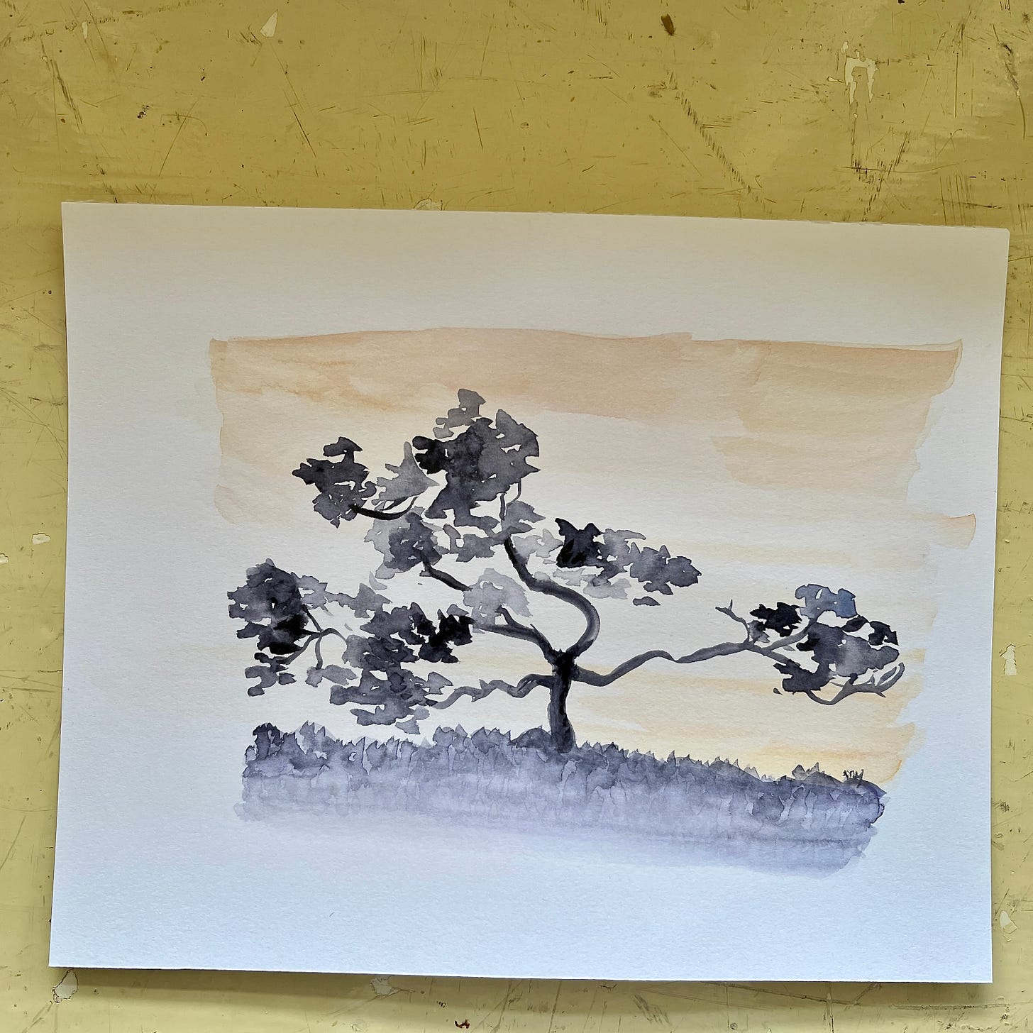 Image: a watercolour painting of a late evening scene. The colour of the sky is a velvety shade of ash with a tinge of burnt orange. The sky was fronted by the silhouettes of the trees.