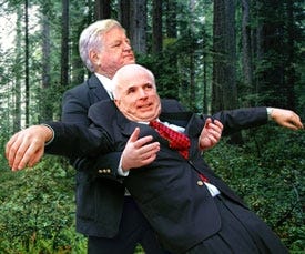 Sen. John McCain (R-AZ) falls into the arms of Sen. Ted Kennedy (D-MA), learning about the importance of bipartisan trust.