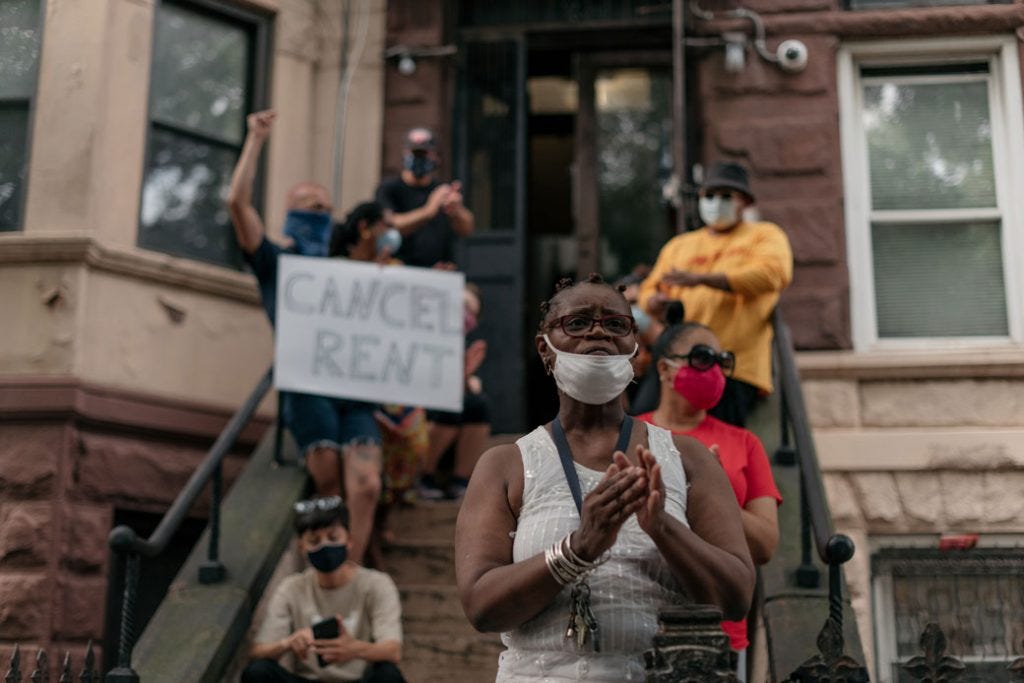 Housing activists gather in the Crown Heights neighborhood in Brooklyn, New York, on July 31, 2020.
