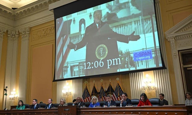 A video showing former president Donald Trump speaking appears on screen during a House select committee hearing on the January 6 attack on the US Capitol.