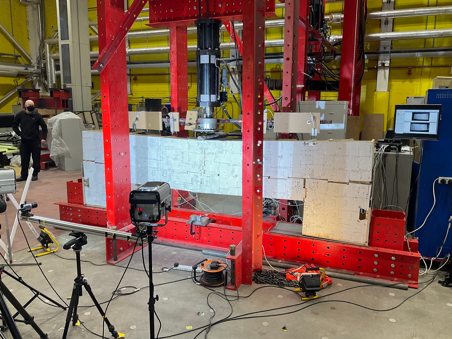 Image of lintel block being breaking after testing in the lab.