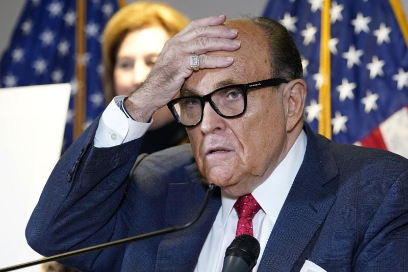 FILE - Former New York Mayor Rudy Giuliani, who was a lawyer for former President Donald Trump, speaks during a news conference at the Republican National Committee headquarters in Washington, on Nov. 19, 2020. Giuliani is scheduled to appear in an Atlanta courthouse on Aug. 17, 2022, to testify before a special grand jury in an investigation into possible illegal attempts to influence the 2020 election in Georgia. (AP Photo/Jacquelyn Martin, File)