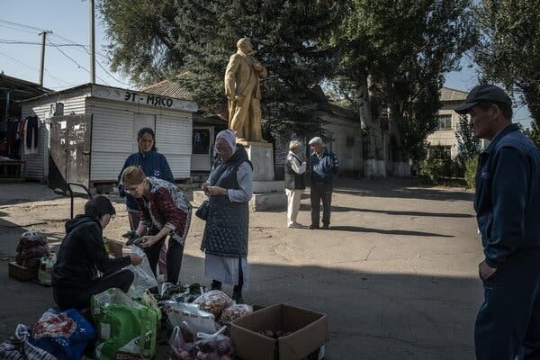 A small market in Orlovka, Kyrgyzstan, is still dominated by a statue of Lenin.