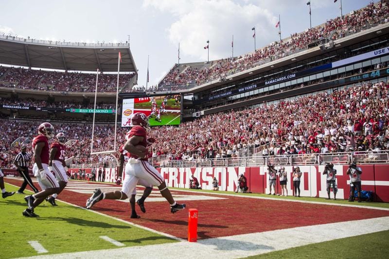 Alabama running back Jase McClellan (21) returns a blocked punt for a touchdown against Mercer during the first half of an NCAA college football game, Saturday, Sept. 11, 2021, in Tuscaloosa, Ala. (AP Photo/Vasha Hunt)