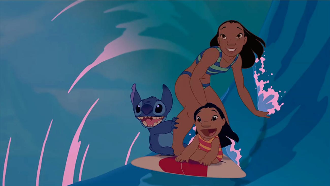 Lilo, Nani, and Stitch on a surfboard.