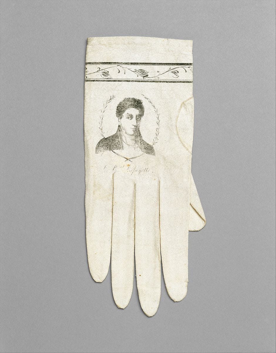 photo of white gloves with a sketch of a man's bust
