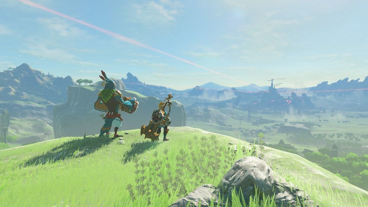 Kass and Link overlooking Hyrule’s green fields from the Great Plateau.