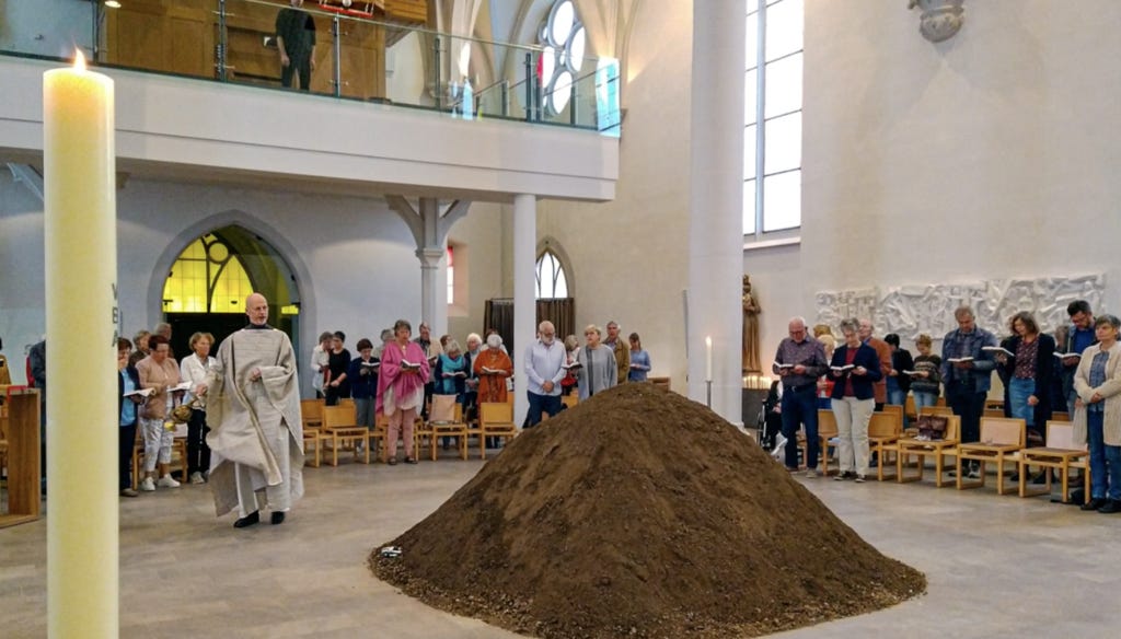 Maria Geburt Catholic Church in Aschaffenburg, Germany, installed a pile of dirt as its new altar on which the Body and Blood of our Lord and Savior, Jesus Christ, comes to the world.