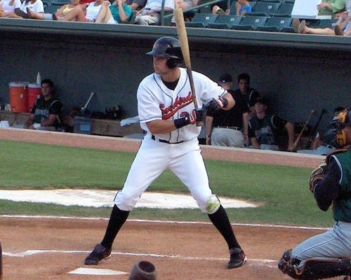 Shorebirds outfielder Jarod Rine peers over to get the sign from his third base coach.