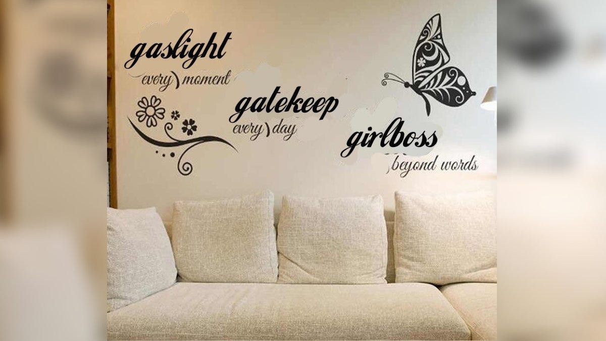 A poorly edited wall stencil of gaslight, gatekeep, and girlboss.