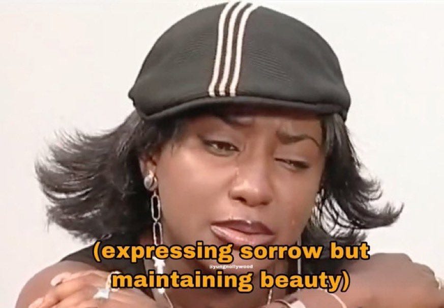 Black woman crying with hands on shoulders. The text at the bottom reads "expressing sorrow but maintaining beauty"