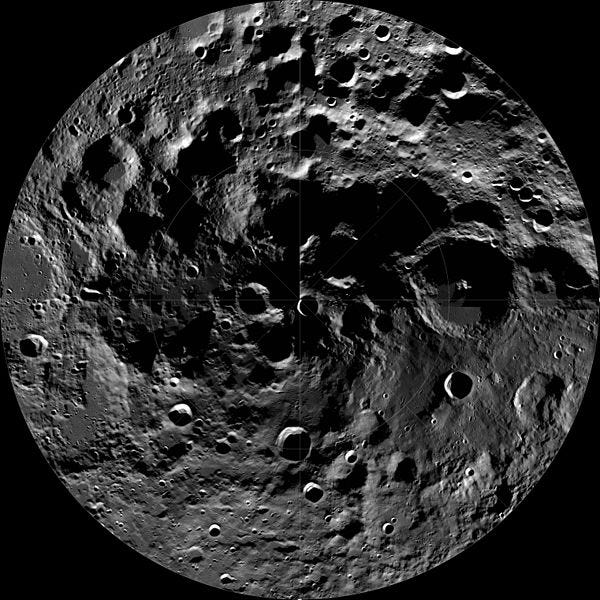Craters and light spots in a circular image of the moon's south pole