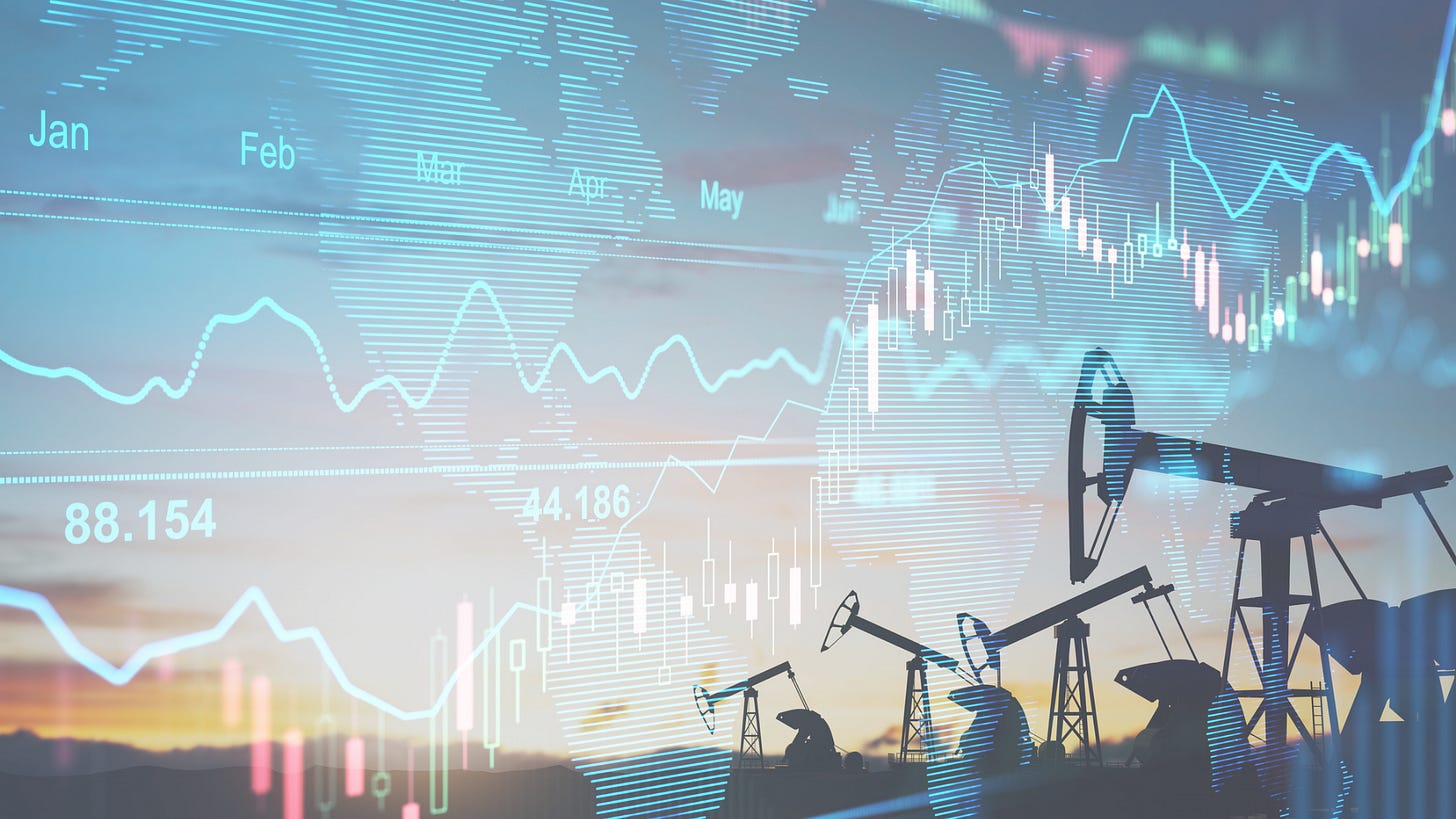 a photo showing stock trends per month with oil rigs in background