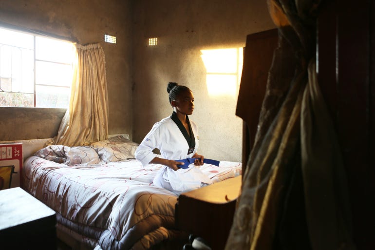 Natsiraishe Maritsa inside her room in the Epworth settlement near Harare [Tsvangirayi Mukwazhi/AP]