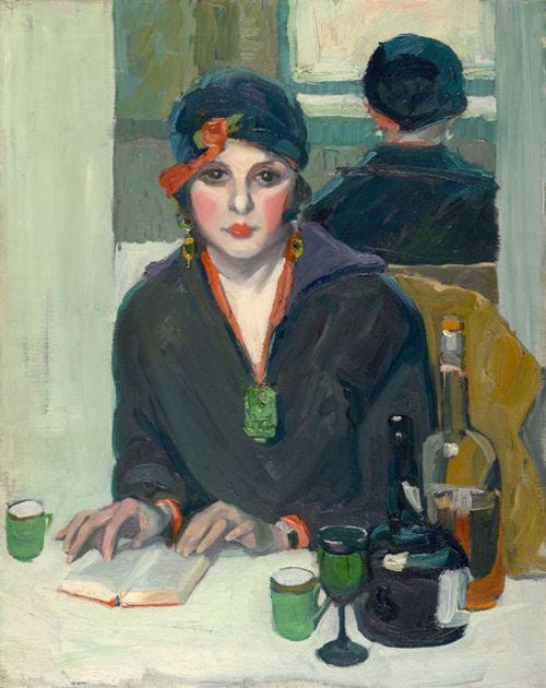 A woman is seated at a cafe with an open book. She fixes the viewer with a direct and vigilant stare.