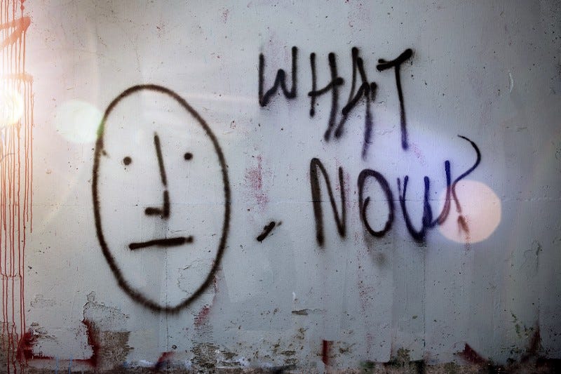 “What now? “ written on a wall