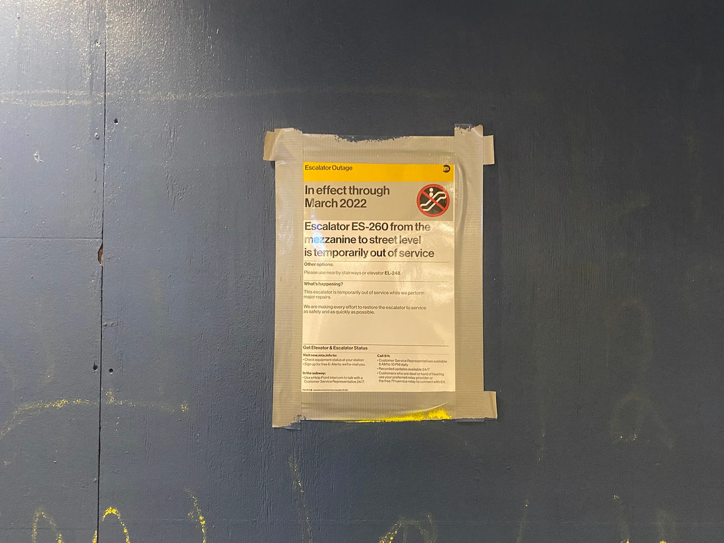Escalator closure sign in the subway