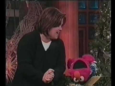 Rosie O'Donnell and Elmo performing together