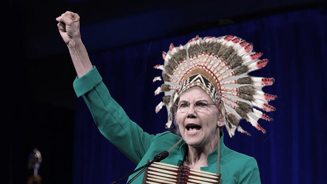 Warren wears native headdress while vowing to criminalize ...
