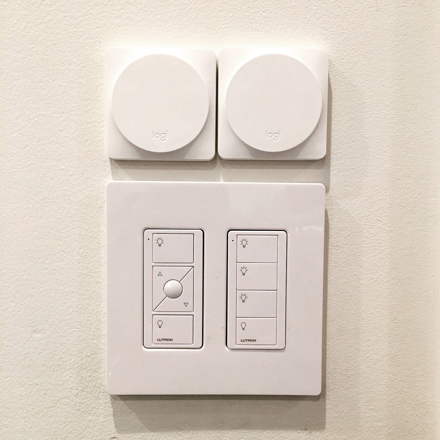 Here are two POP buttons in my house, above the Lutron switches