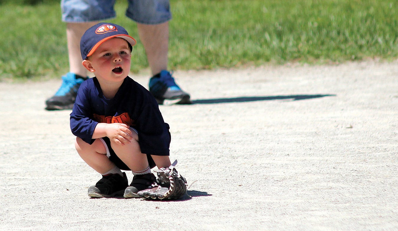 Organized chaos is how one parent described a baseball game among four- and five-year-olds in Knightstown. At this level, game rules are often eschewed so the kids can just get the hang of hitting, fielding and running the bases. Waiting for a hit, however, can be boring, as this young infielder discovered.