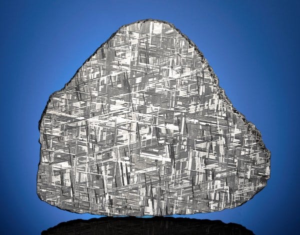 A MUONIONALUSTA METEORITE SLICE — SHIMMERING CRYSTALLINE STRUCTURE, Iron,  fine octahedrite, IVA Kiruna, Sweden (67°48' N, 23°6' E) | Christie's