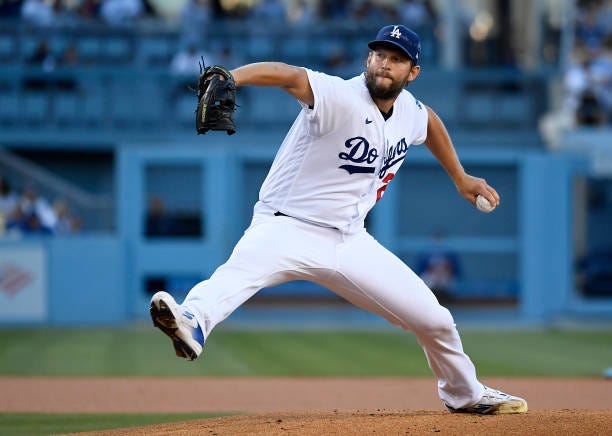 Starting pitcher Clayton Kershaw of the Los Angeles Dodgers throws against the Chicago Cubs during the first inning at Dodger Stadium on July 9, 2022...
