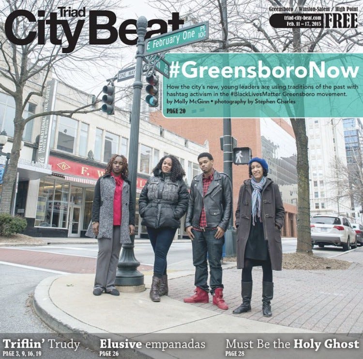Cover of the publication Triad City Beat featuring #GreensboroNow leaders standing on S. Elm Street in front of the International Civil Rights Museum.