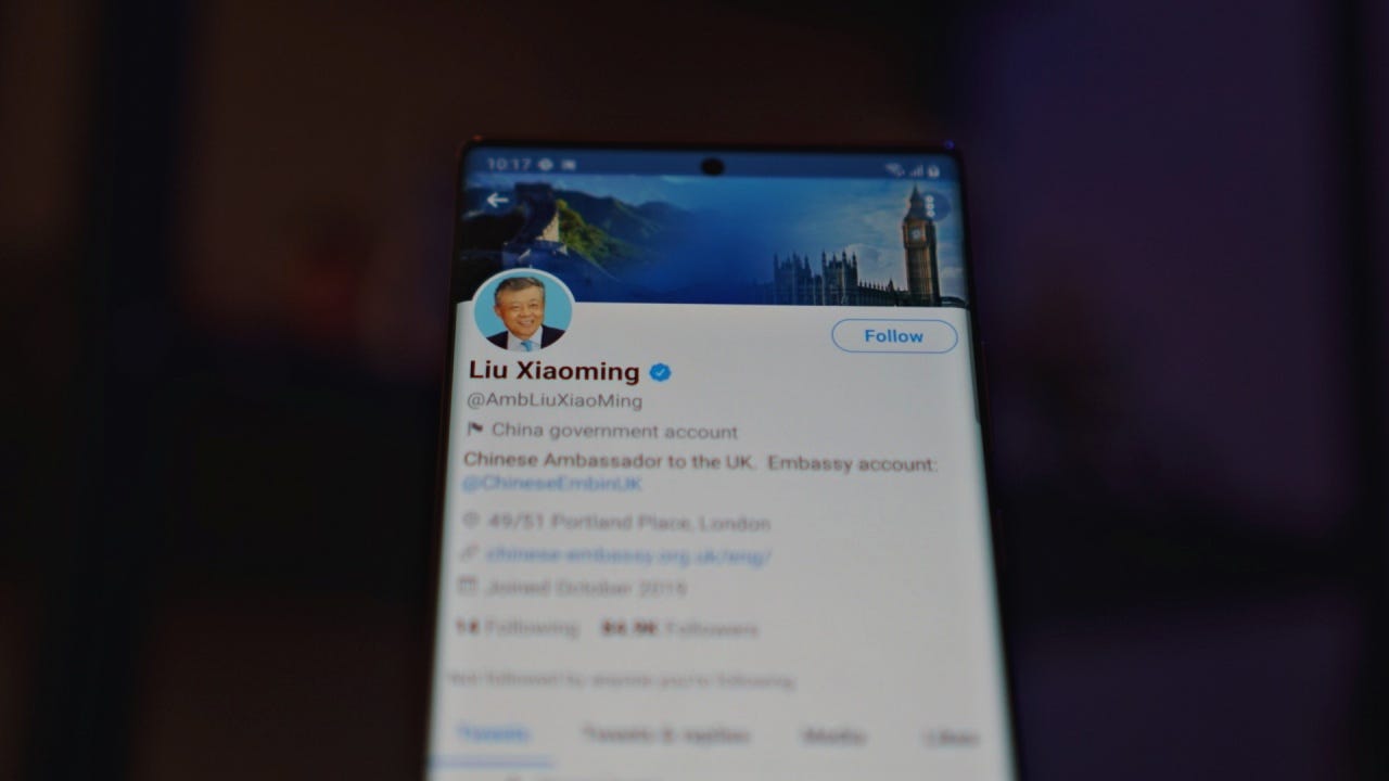 UK's Chinese ambassador is asking Twitter to investigate why his account  likes porn