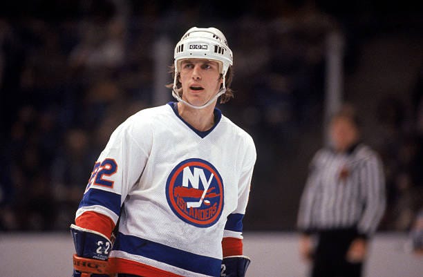 Mike Bossy of the New York Islanders skates during a game in 1984 at Nassau Veterans Memorial Coliseum in Uniondale, New York. Mike Bossy played for...