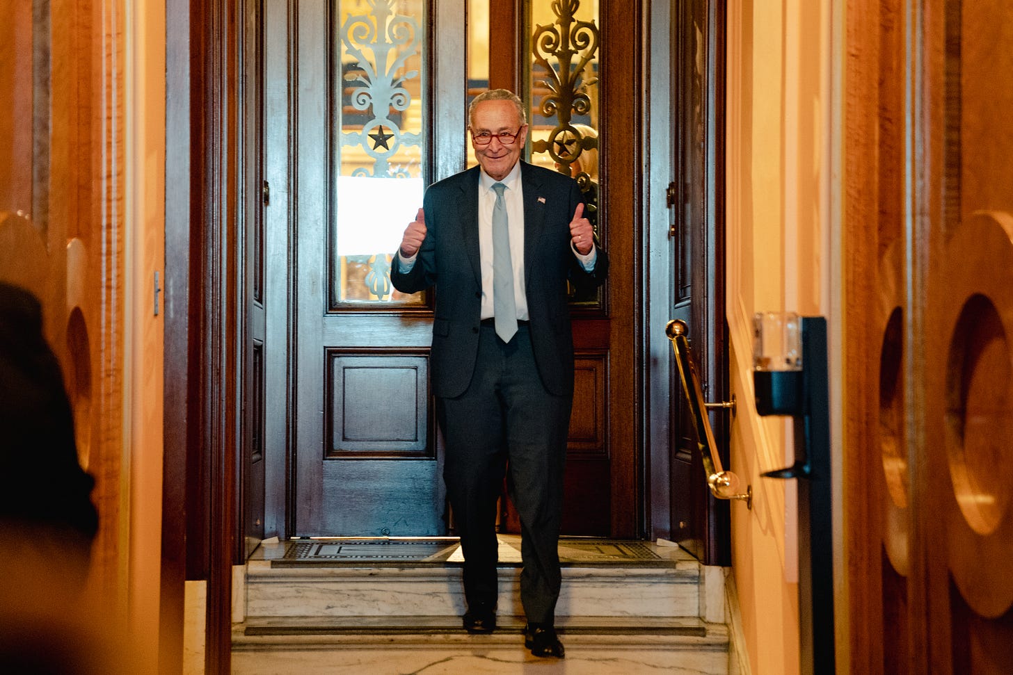 Senate Majority Leader Chuck Schumer (D-NY) gives the thumbs up as he leaves the Senate Chamber after passage of the Inflation Reduction Act on Capitol Hill in Washington, DC on August 7, 2022. (Photo by Shuran Huang for The Washington Post via Getty Images)