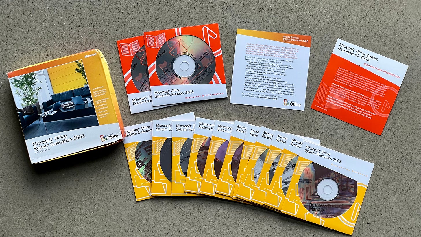 A photo of the Evaluation kit which is 11 program CDs, two information CDs and several pamphlets of instructions.