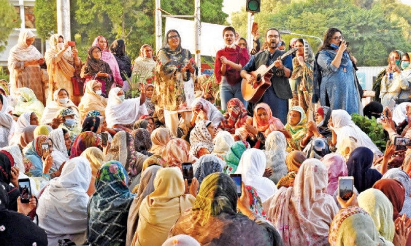 Awami Workers Party activists perform at the site of the protest being staged by lady health workers in Islamabad on Saturday. — Online