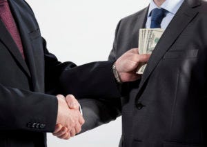 Giving bribe into a pocket