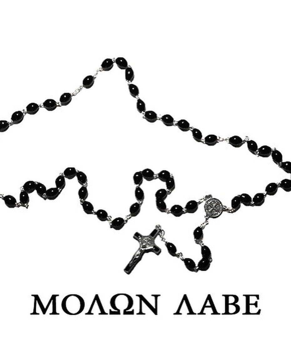 May be an image of text that says 'ΜΟΛΩΝ лaBe'