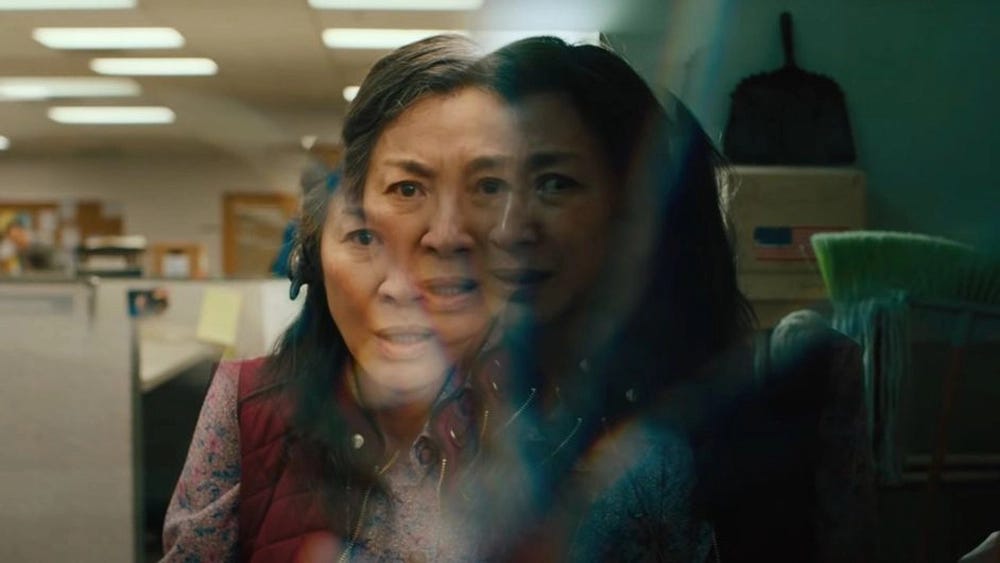 Evelyn from A24's "Everything, Everywhere, All At Once" fracturing as the multiverse makes itself known.