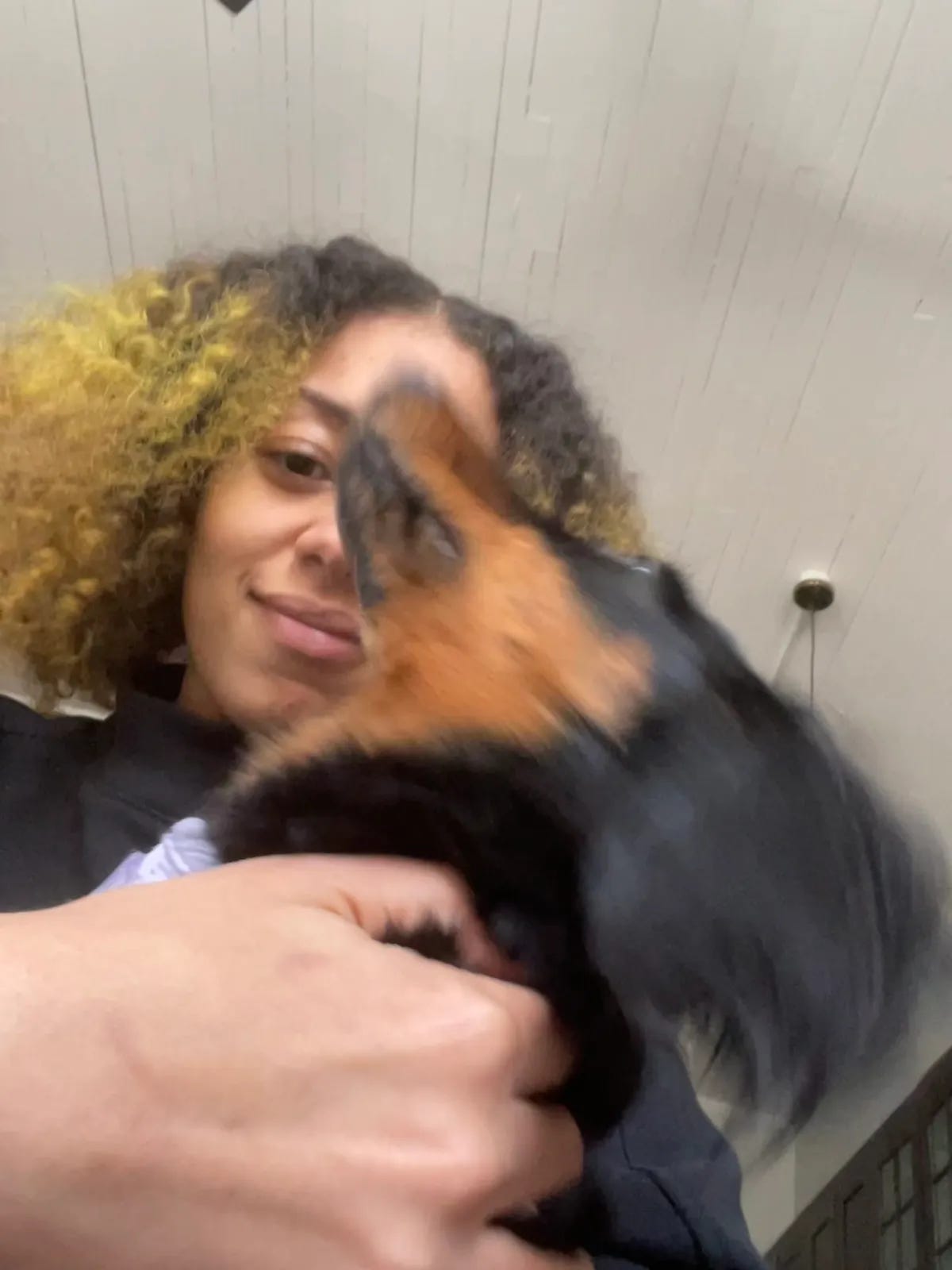 Rawiya Kameir with dog