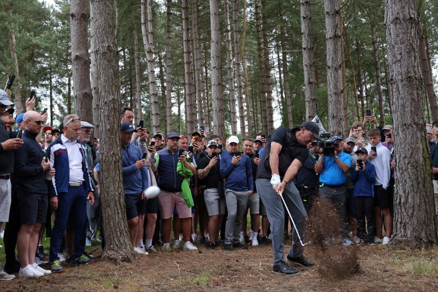 Phil Mickelson plays from the pine needles on the 3rd hole.