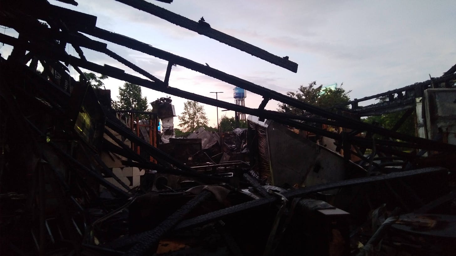 Sunset through the ruined Wendy’s on the evening of Sunday, June 14