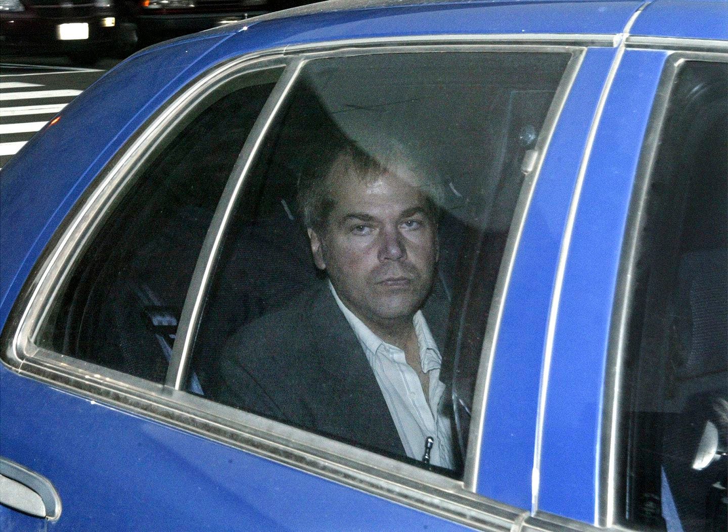 John Hinckley Jr. arrives at U.S. District Court in Washington in 2003. Lawyers are scheduled to meet in federal court on Monday to discuss whether Hinckley Jr., the man who tried to assassinate President Ronald Reagan, should be freed from court-imposed restrictions including overseeing his medical care and keeping up with his computer passwords.