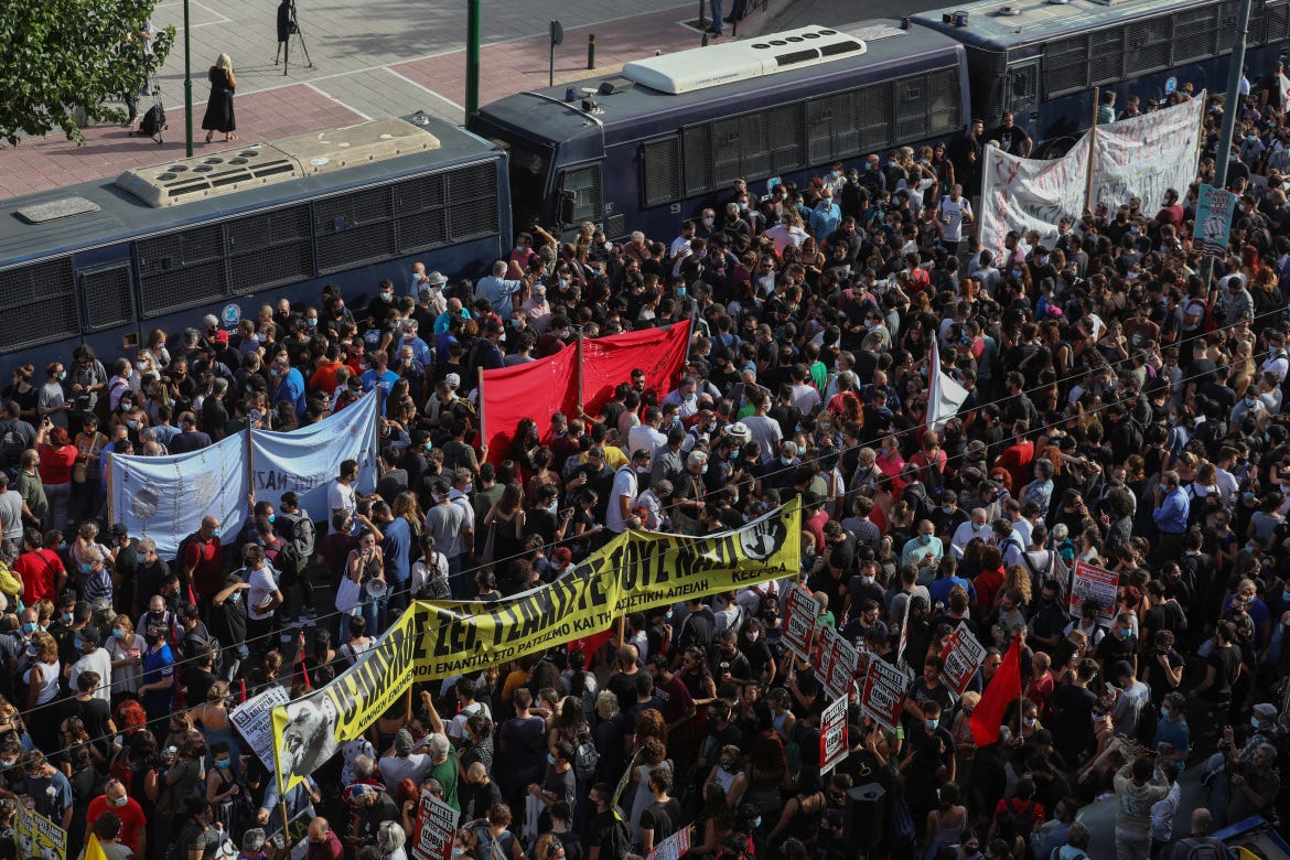 Thousands of anti-fascism protesters gathered outside the appeals court in Athens holding banners reading "Fascism, Never Again" and "Freedom for the People, Death to Fascism". [Yorgos Karahalis/AP Photo]