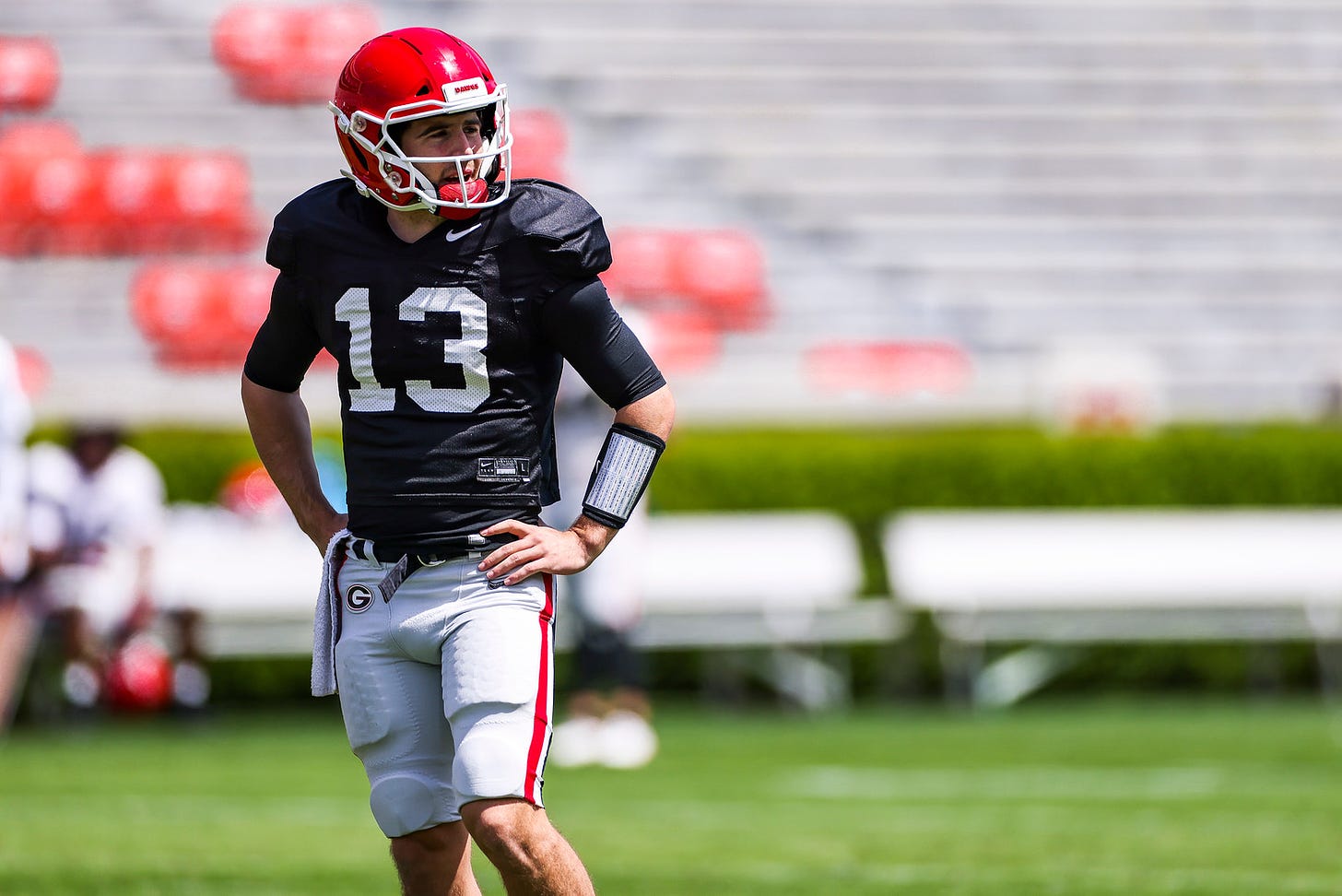 Georgia quarterback Stetson Bennett (13) during the Bulldogs’ practice session on Dooley Field at Sanford Stadium in Athens, Ga., on Saturday, April 3, 2021. (Photo by Tony Walsh)