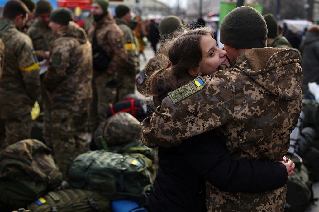 A couple hugs prior to the Ukrainian army's deployment.