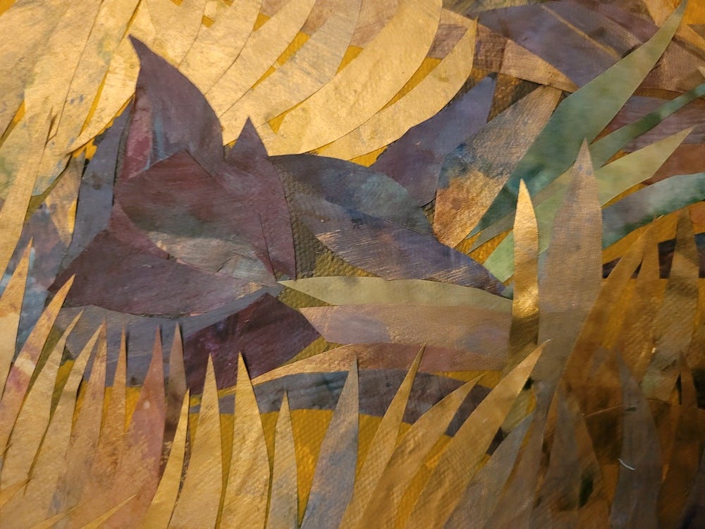 Detail of collage by Edie Meade, with purple and gold leaf-shaped pieces