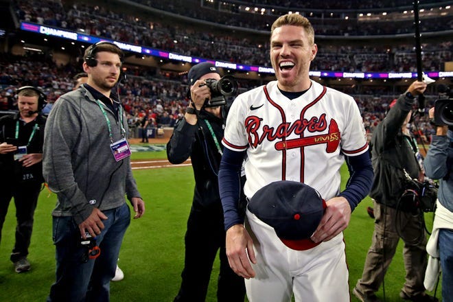 Freddie Freeman is all smiles after the Braves beat the Dodgers.