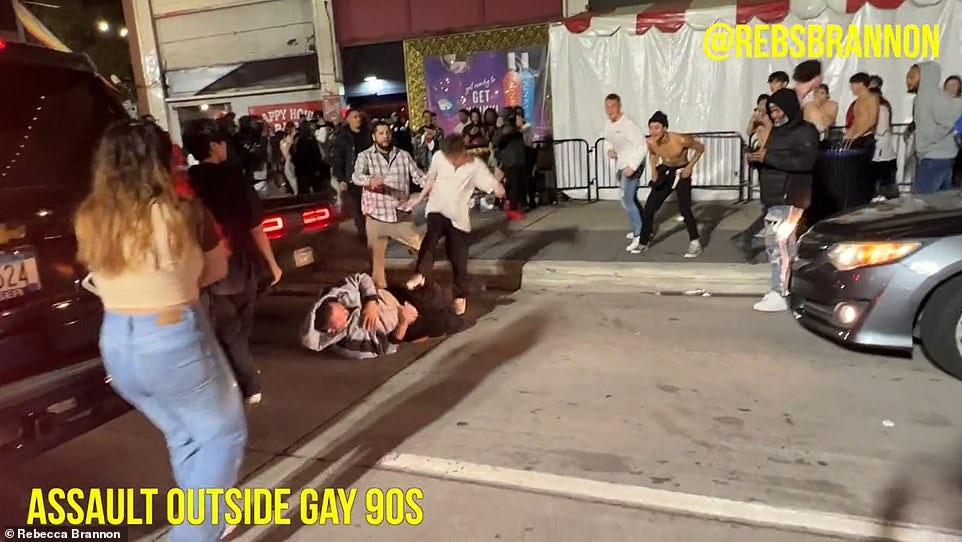 Video posted online shows a group of men assaulting a victim in the street outside a gay bar