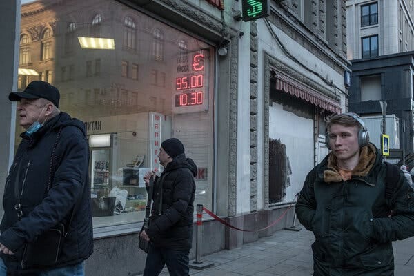 A shop in Moscow on Monday displayed the plunging exchange rate for the ruble.