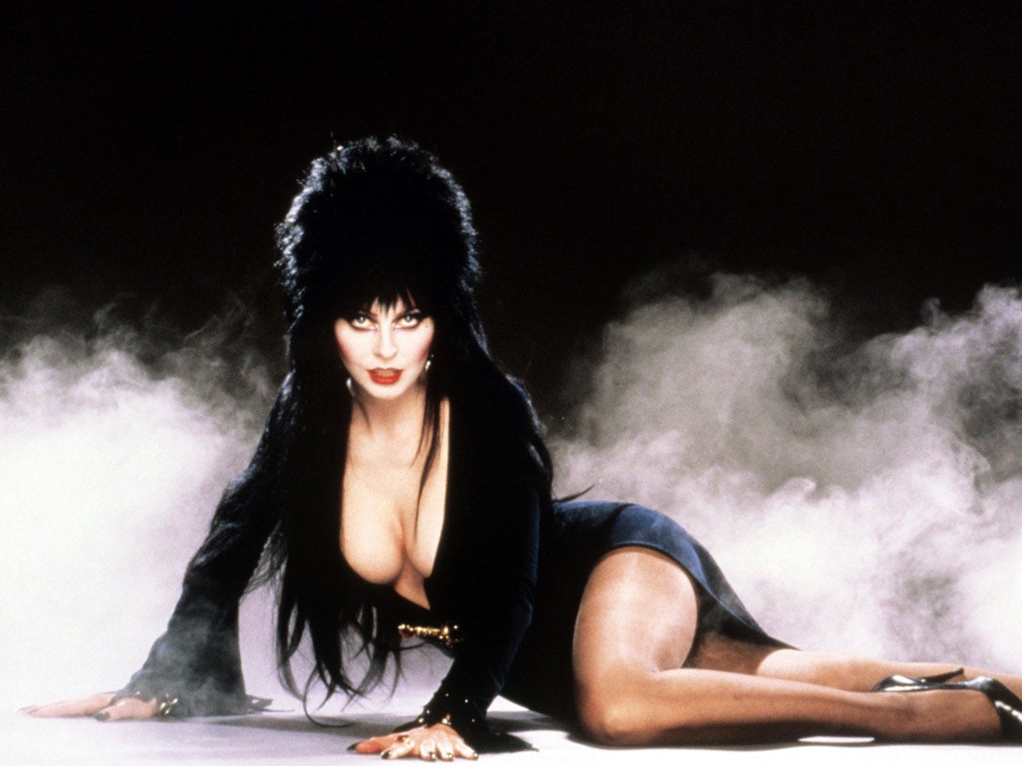 Let Elvira Teach You A Thing Or Two About Camp | them.