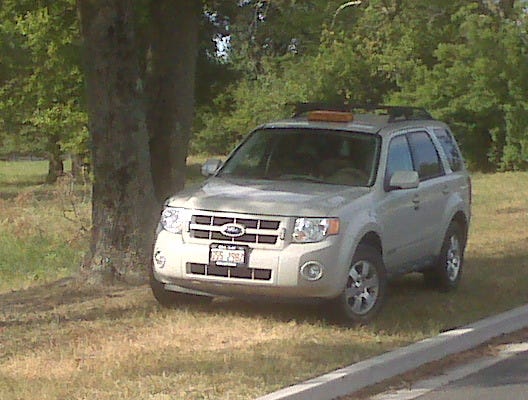 This silver Ford Escape with Illinois tags contains the equipment. It was spotted parked in a small grove of trees along N. Division Street in Fruitland. The photo was taken by a person who wishes to remain anonymous.