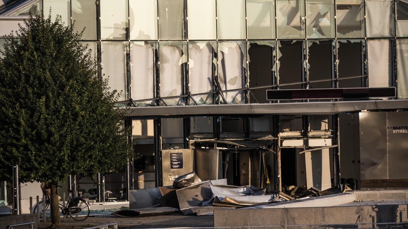 The front with broken windows of the Danish Tax Authority at Oesterbro in Copenhagen, Denmark, Wednesday, August 7, 2019. On Tuesday evening, police received reports of a powerful explosion near Nordhavn Station. Police confirm that there has been a powerful explosion in front of the Danish Tax Agency .. (Photo: Ãlafur Steinar Rye Gestsson / Ritzau Scanpix)